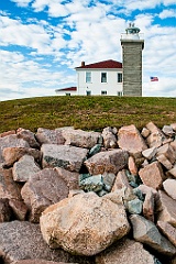 Watch Hill Light Surrounded by Rocks for Protection